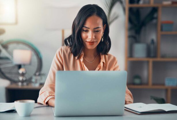 Woman using a standard user desktop laptop
