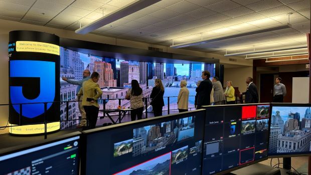 Immersive education and research room with thirty foot wide LED video wall