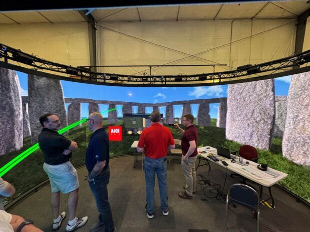 IDIA Lab Ball State VR Experience in a staging environment with people standing in the space
